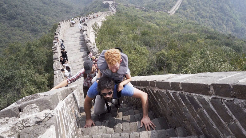 Kevan hiking the Great Wall of China with friends