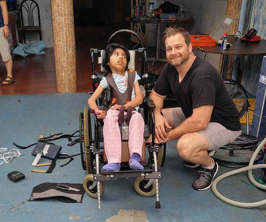 Matt Fetter helping a young Guatemalan