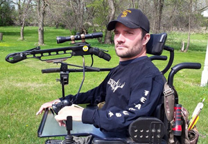 Barnett Wildcat crossbow attached to wheelchair. Practicing for turkey hunting.