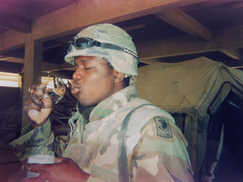 Johnnie blowing a bubble while deployed
