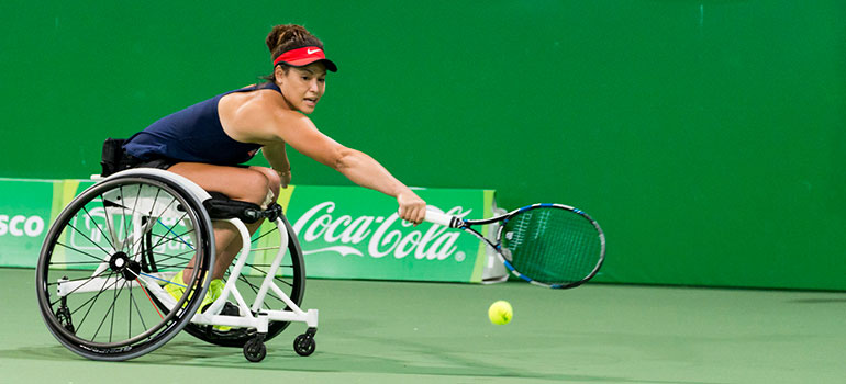 Dana Mathewson playing wheelchair tennis