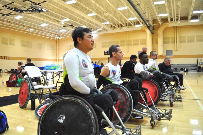 Wheelchair rugby players lined up