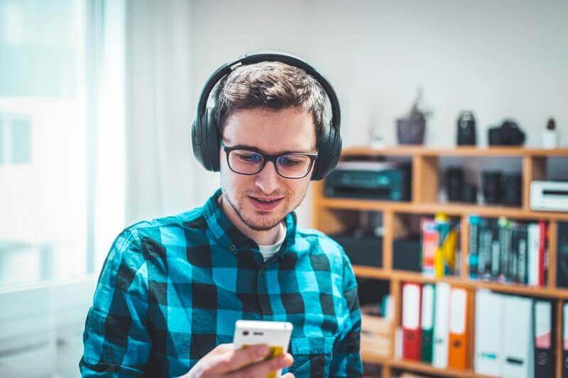 A man listening to music at home
