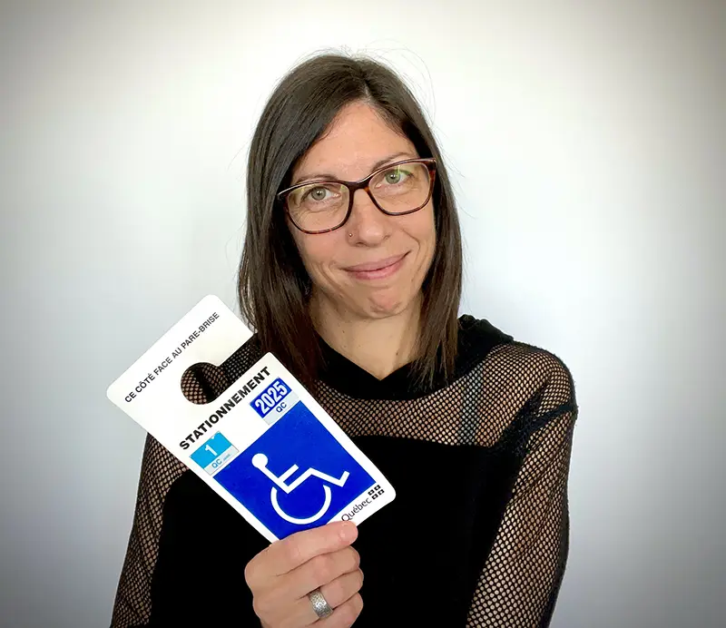Geneviève with her handicap parking placard