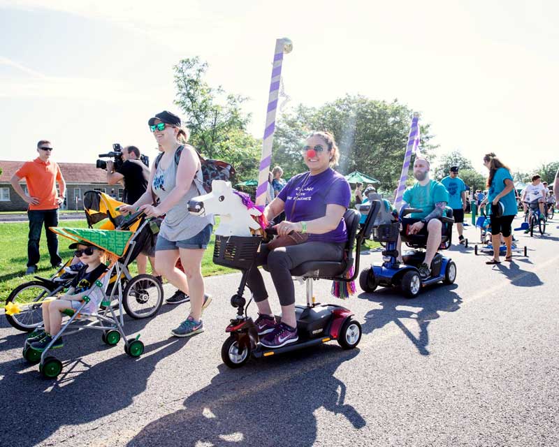 Scooter riders in the parade