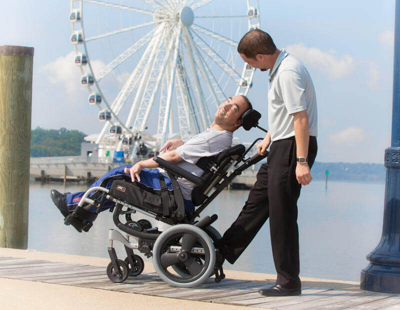 A person with a disability with his caregiver