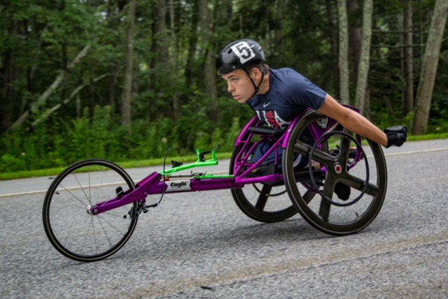 Jason Robinson riding his racing wheelchair