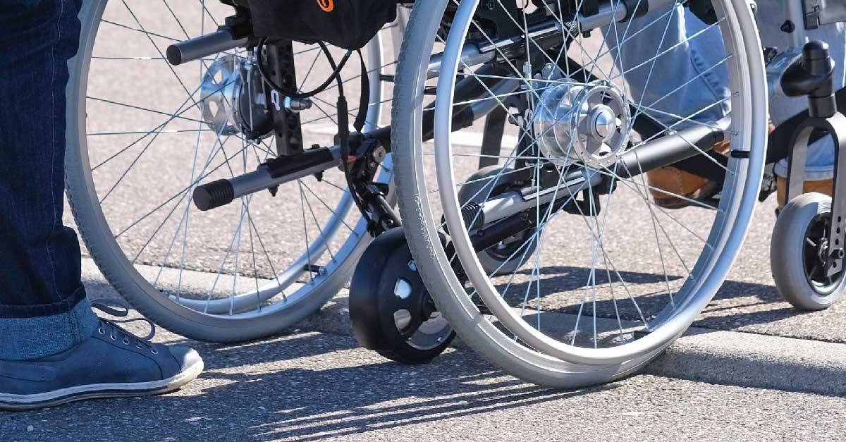 Empulse R20 attendant power pack fitted to a manual wheelchair