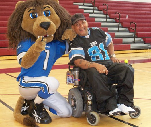 Leaping Larry with the Detroit Lions mascot, Roary